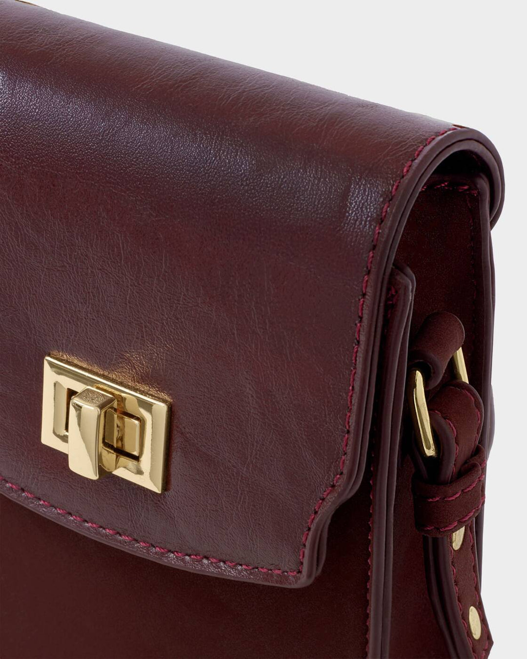 Katie Loxton Orin Twist Lock Slim Bag Cherry Suedette/ Cherry Distressed