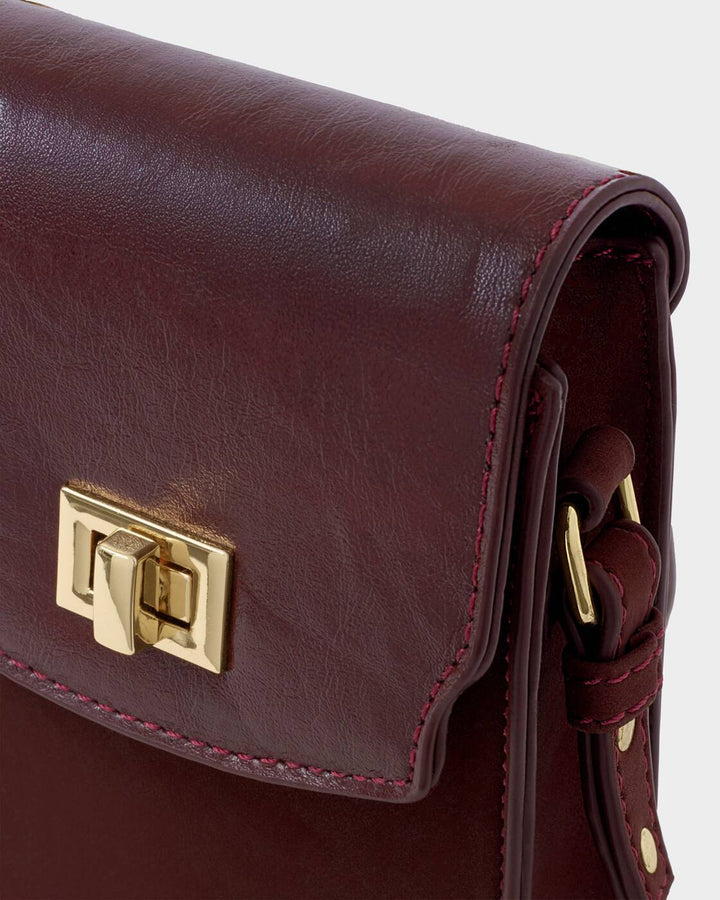Katie Loxton Orin Twist Lock Slim Bag Cherry Suedette/ Cherry Distressed